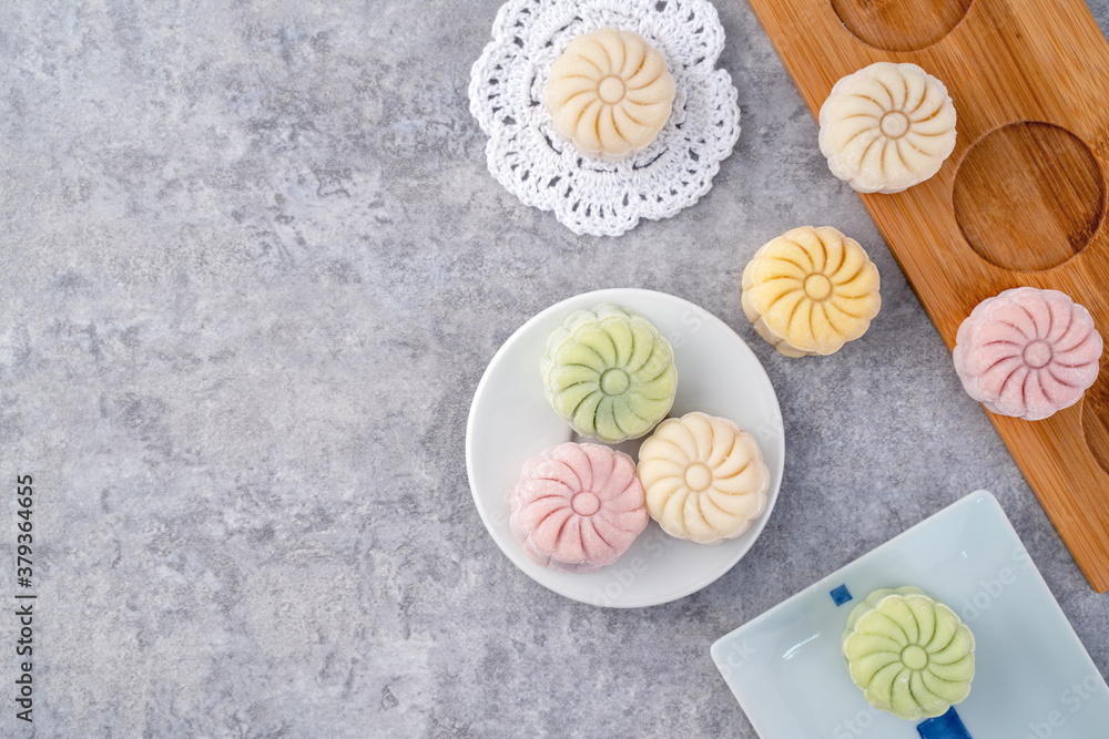 Colorful snow skin moon cake, sweet snowy mooncake, traditional savory dessert for Mid-Autumn Festiv