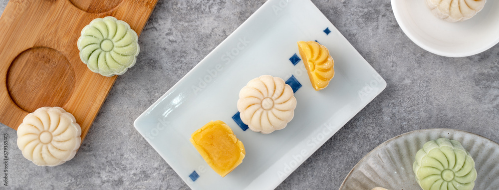 Colorful snow skin moon cake, sweet snowy mooncake, traditional savory dessert for Mid-Autumn Festiv