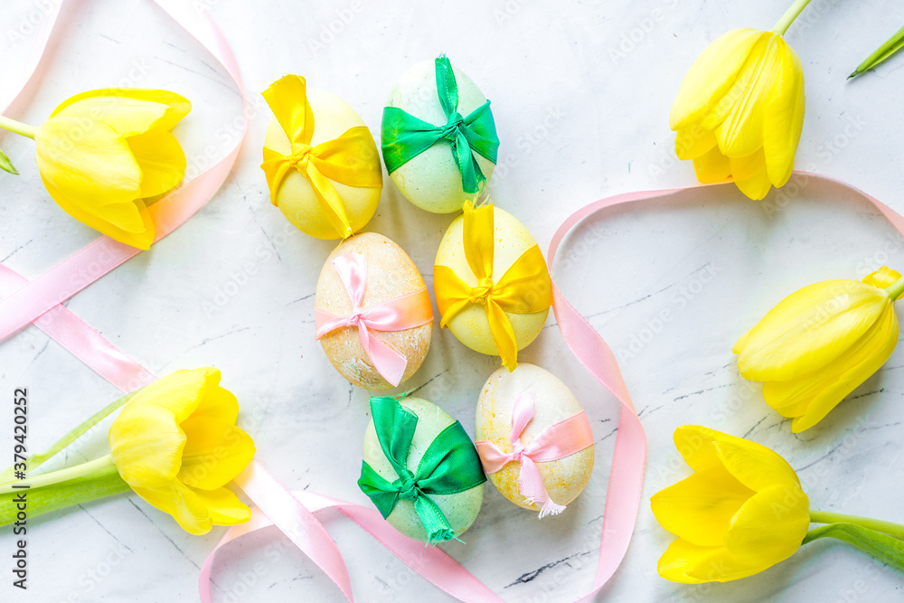 Easter concept eggs with tulip top view pattern