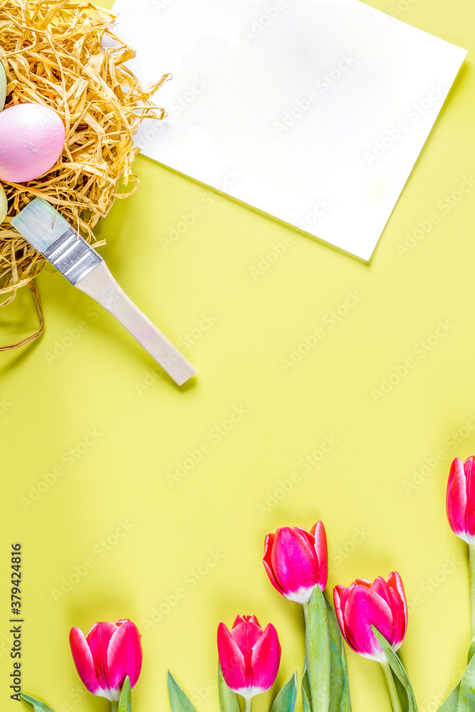 Easter concept on yellow background top view mockup