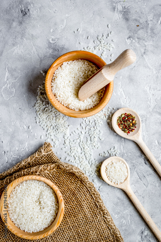 rice for paella on stone background top view mock up