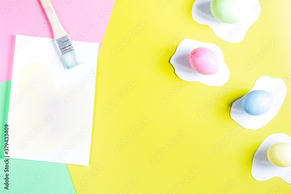 Easter concept on yellow background top view mockup