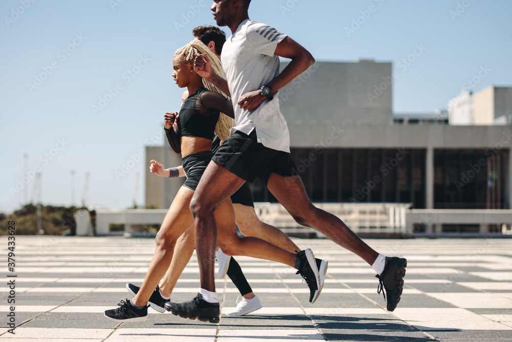 Street runner exercising in the city