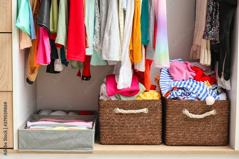 Modern wardrobe with clean clothes