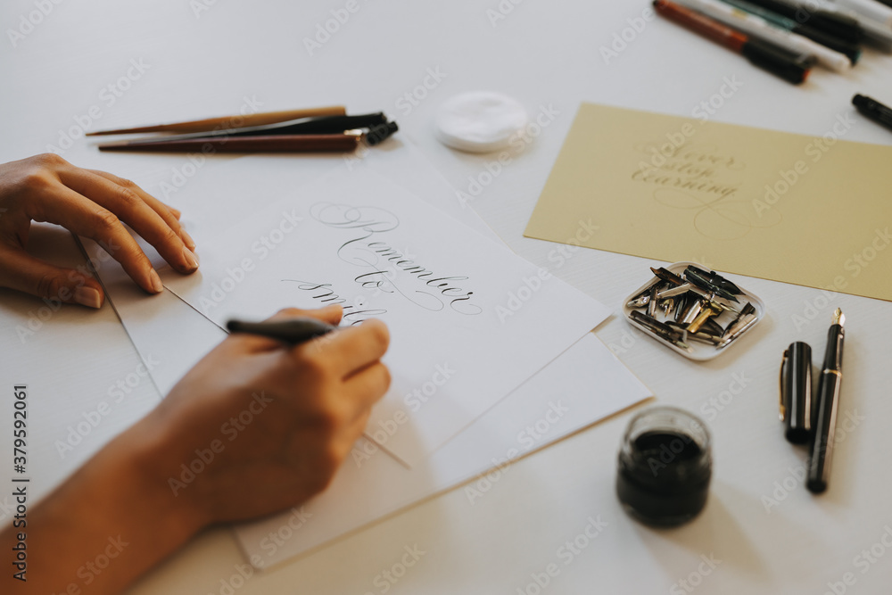 Calligraphy artist working on a project.