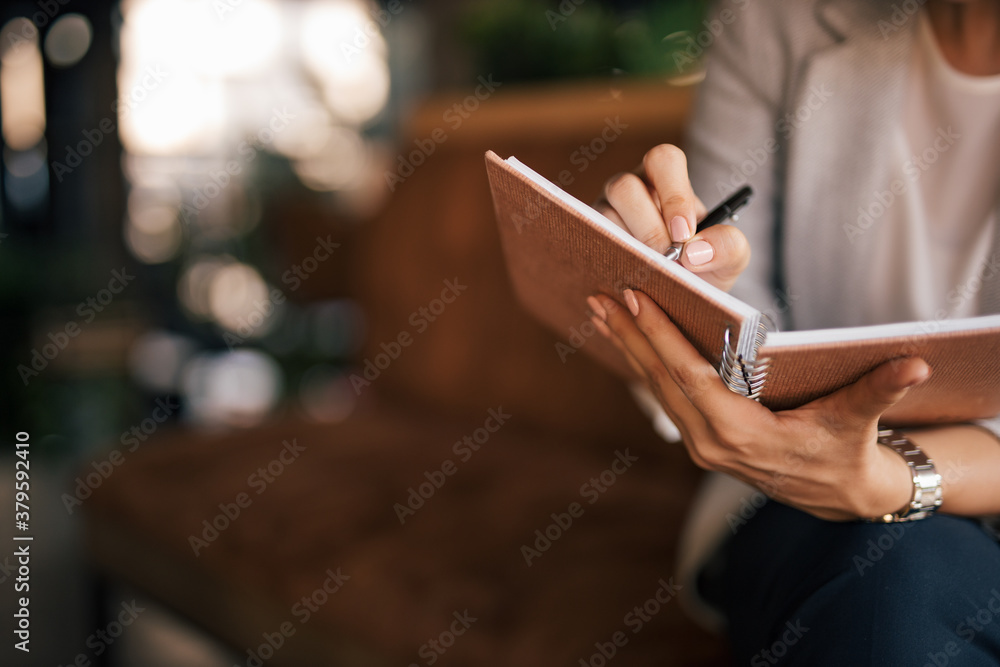 Brown background, focus on notes.