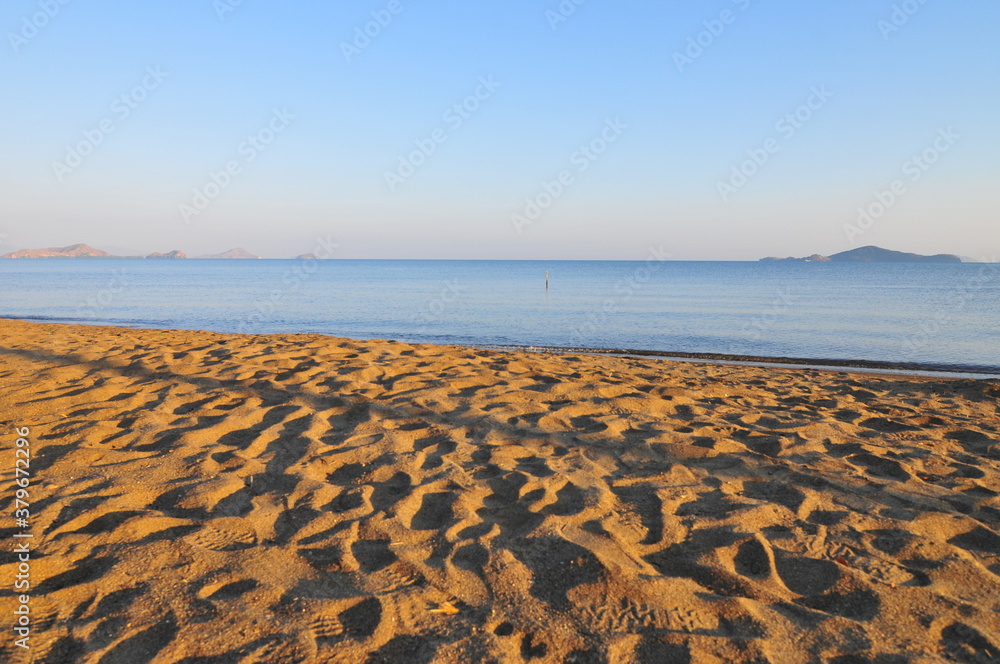 Scenic View of Tropical Beach and Sand Waves in Labuan Bajo, Indonesia.