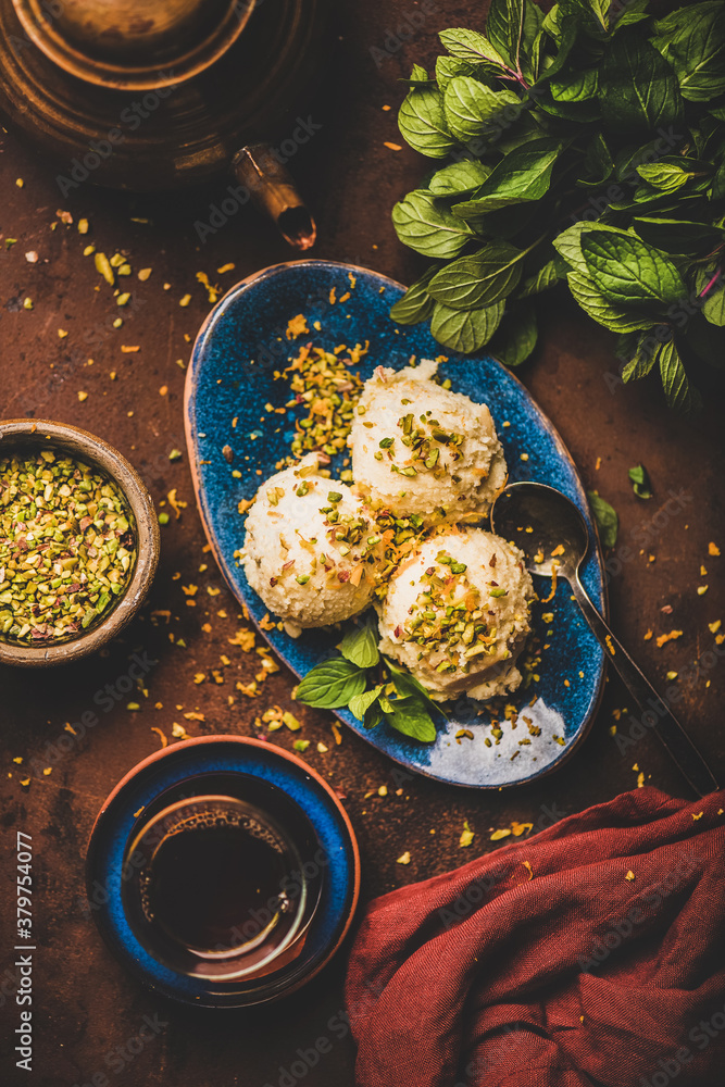 Turkish traditional dessert semolina helva. Flat-lay of scoops of sweet semolina helva with chopped 