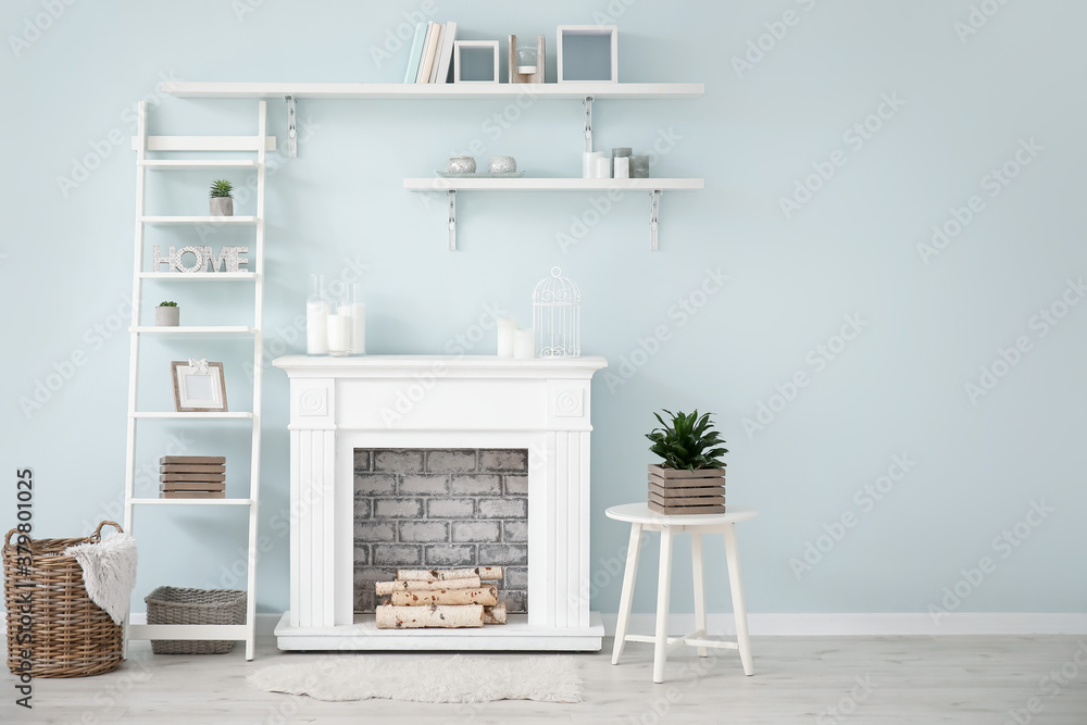 Modern fireplace with shelves in interior of room