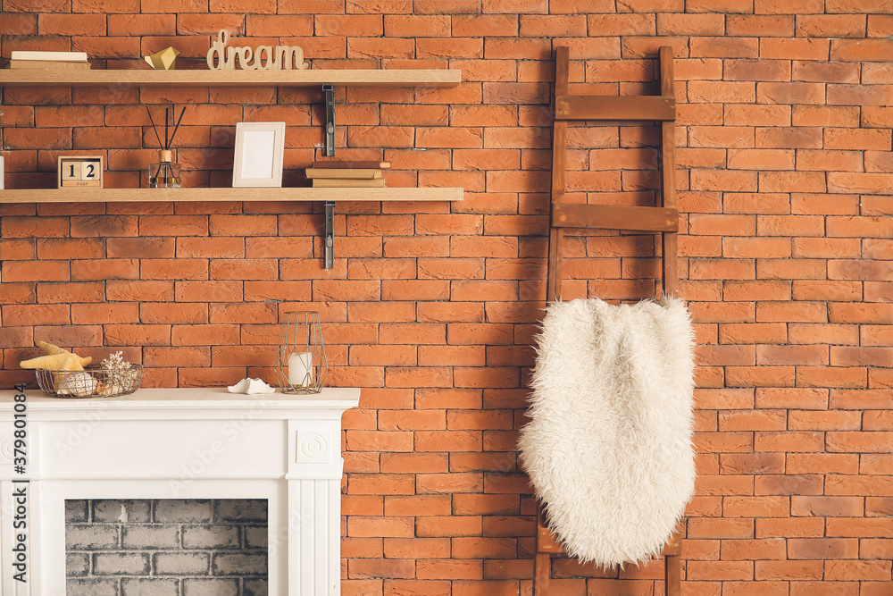 Modern fireplace with shelves in interior of room