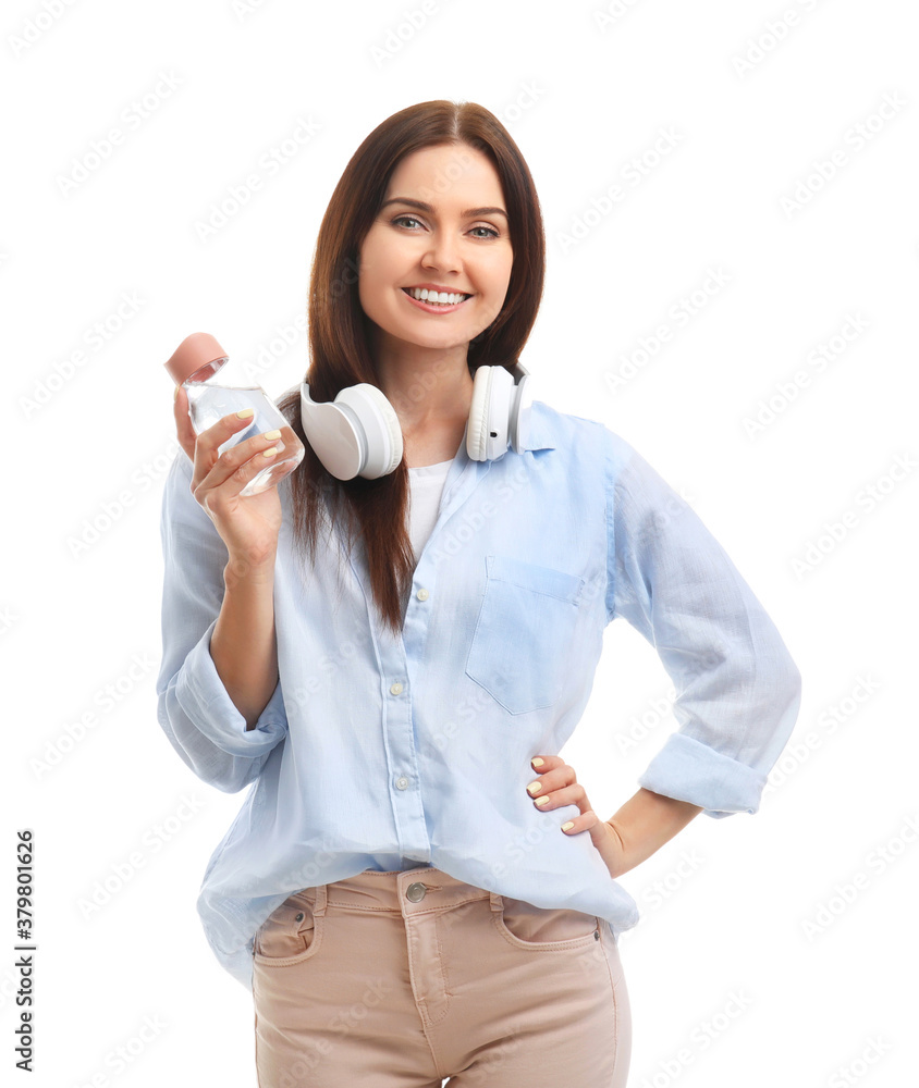 Young woman with bottle of water on white background