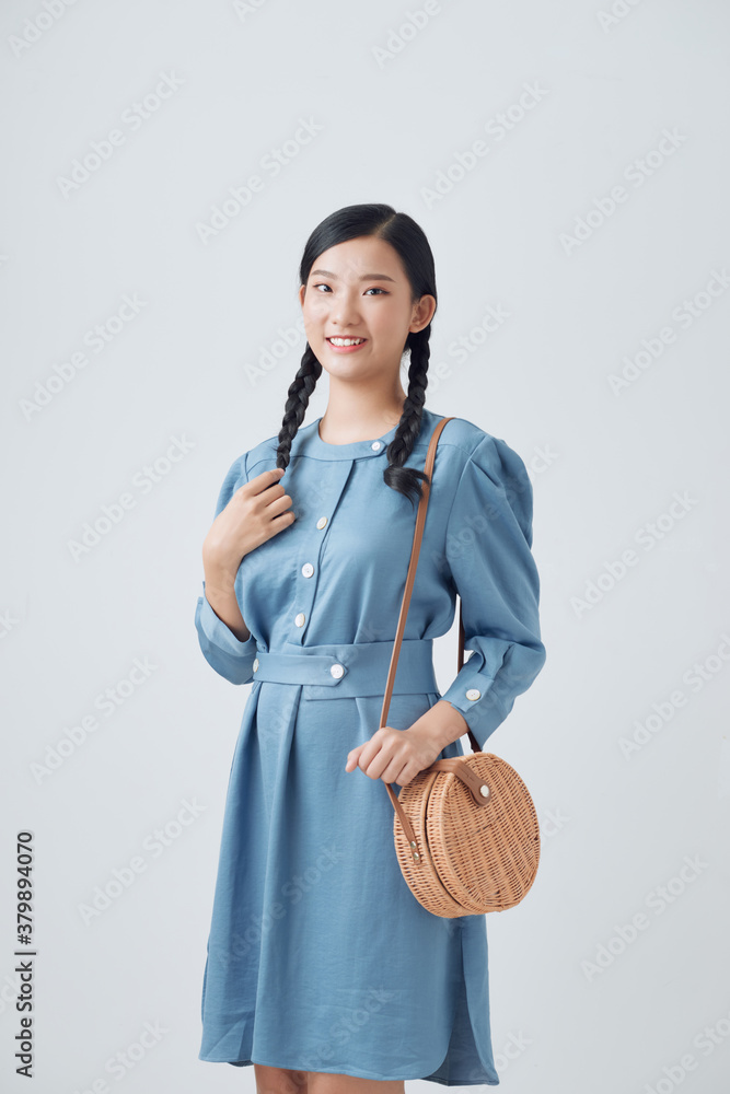 Summer sunny lifestyle fashion portrait of young stylish Asia woman wearing cute trendy outfit