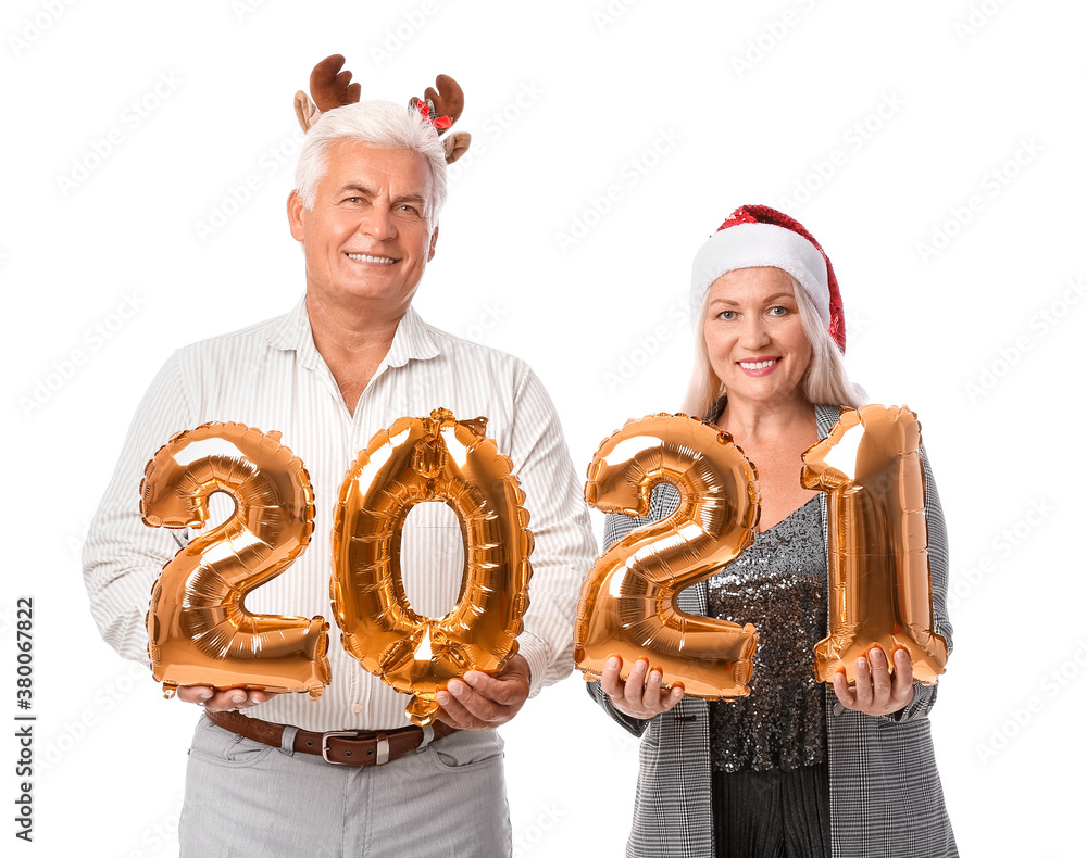 Elderly couple with figures 2021 on white background. New Year celebration