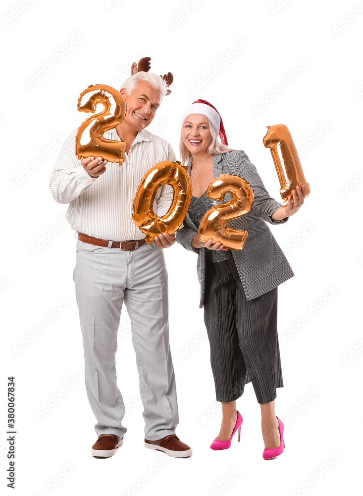 Elderly couple with figures 2021 on white background. New Year celebration