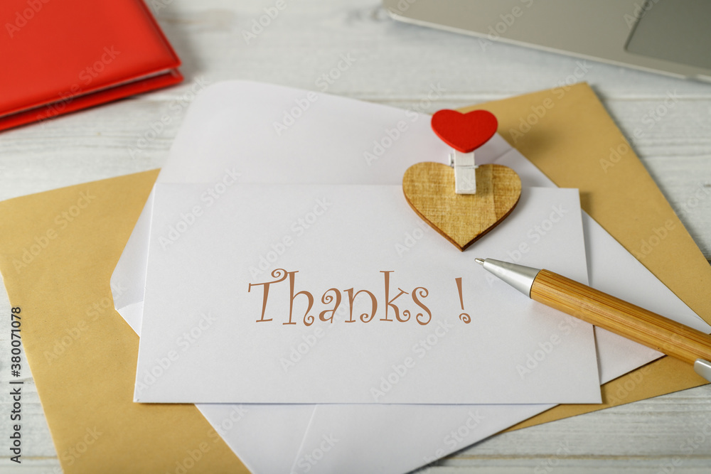 A greeting card with an envelope and a hearts is ready for your text. Closeup