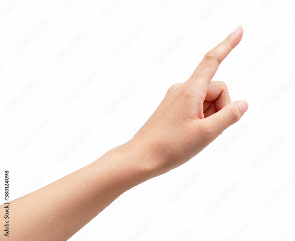 A womans hand points to a white background