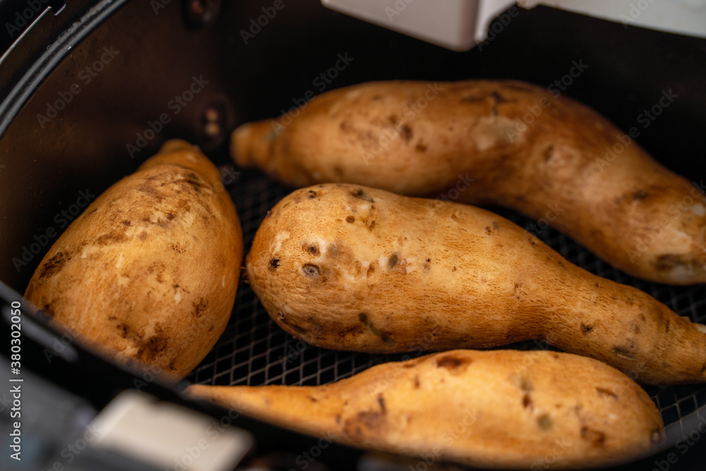 Roasted sweet potato cooked by airfryer at home. Healthy food for diet eating.