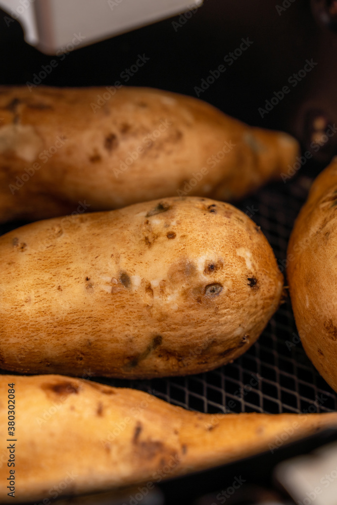 Roasted sweet potato cooked by airfryer at home. Healthy food for diet eating.