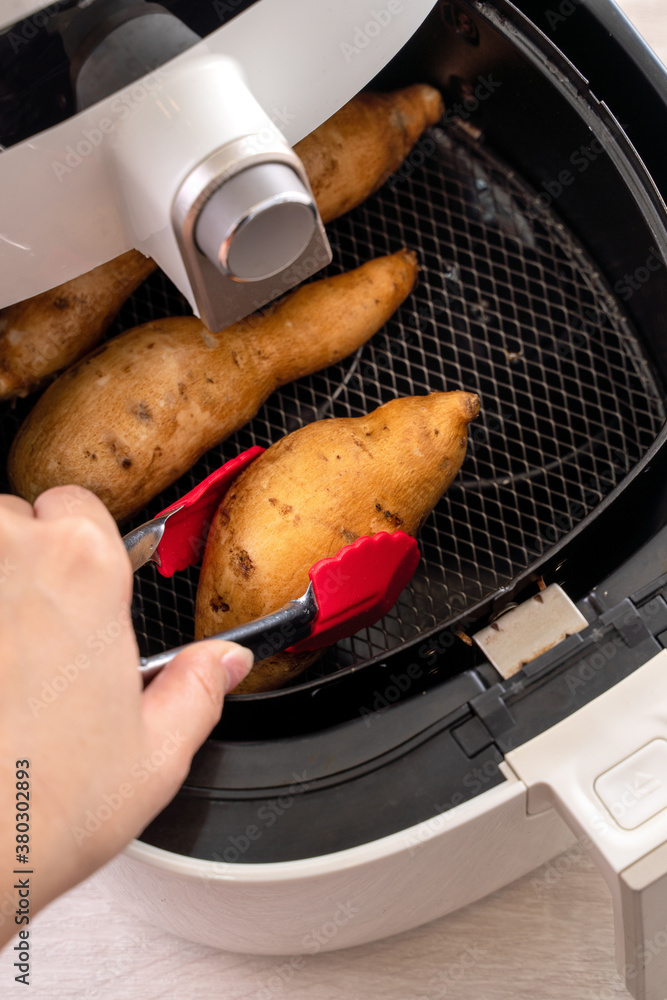 Roasted sweet potato cooked by airfryer at home. Healthy food for diet eating.