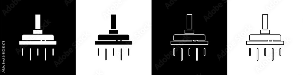 在黑白背景上设置带有水滴流动图标的淋浴喷头。矢量。
