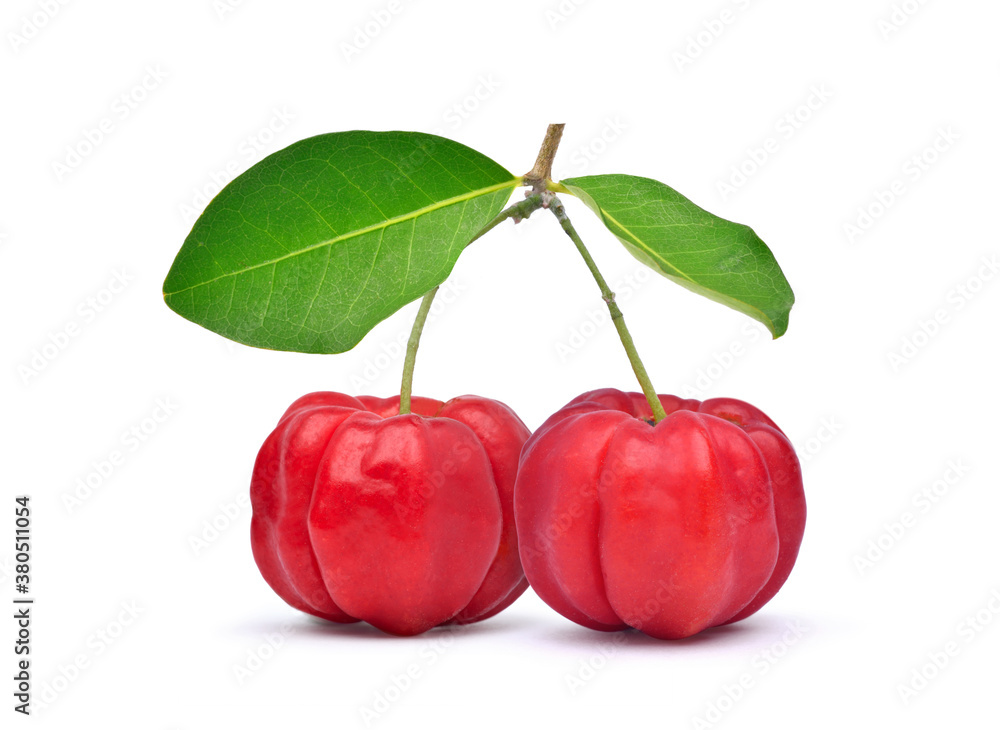 Two red Acerola Cherries with green leaves isolated on white with clipping path, High vitamin C and 