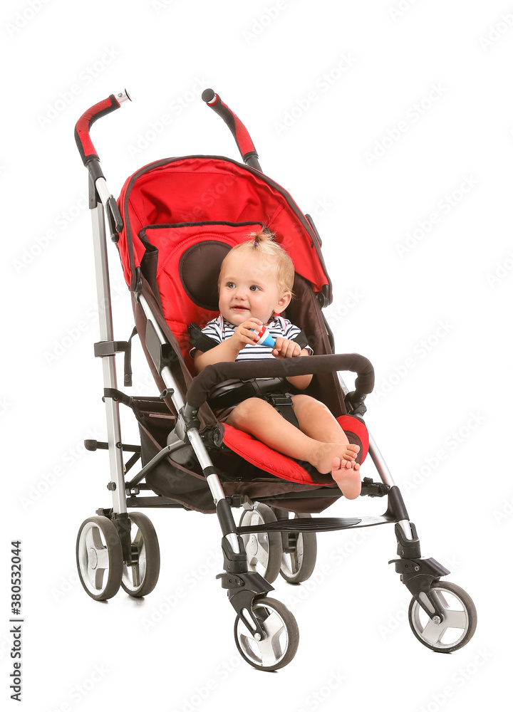 Cute little baby in stroller on white background