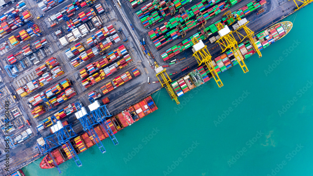 Aerial top view container ship at terminal seaport, Global business cargo freight ship import export