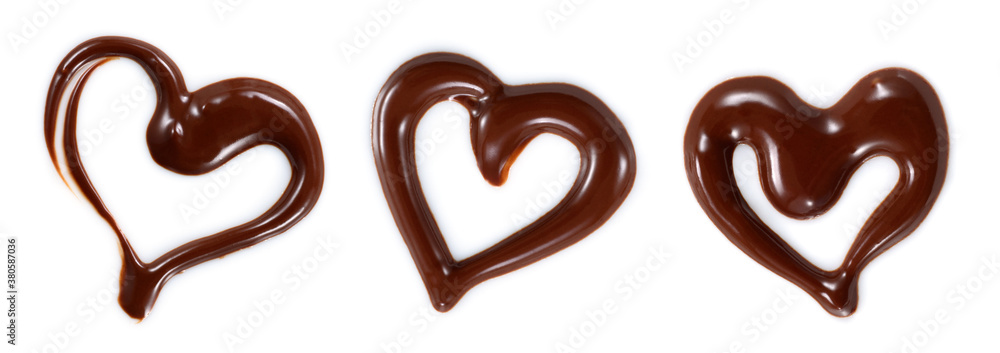 Chocolate sauce isolated. Chocolate heart swirl set on white. Top view. Chocolate syrup heart patter