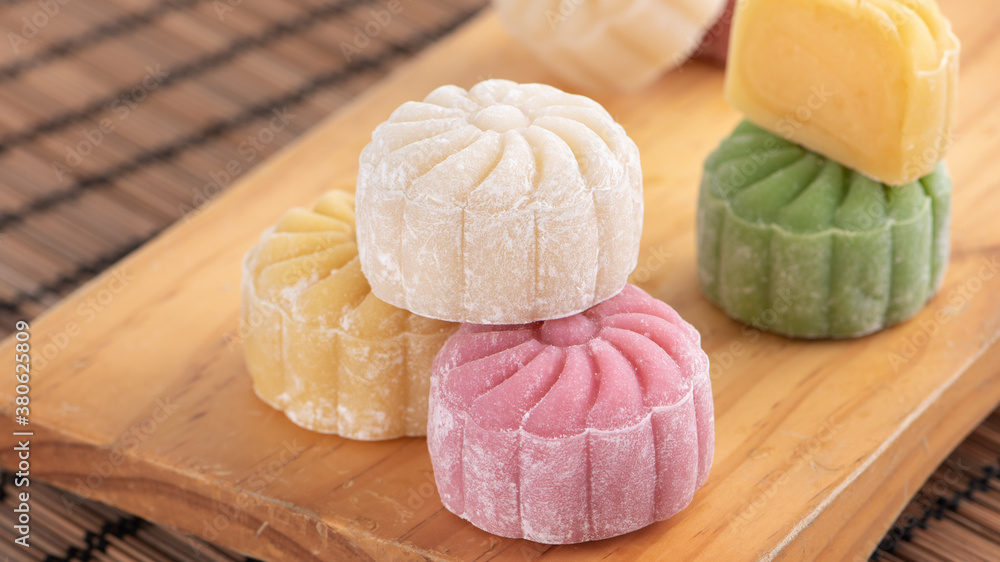 Colorful snow skin moon cake, sweet snowy mooncake, traditional savory dessert for Mid-Autumn Festiv