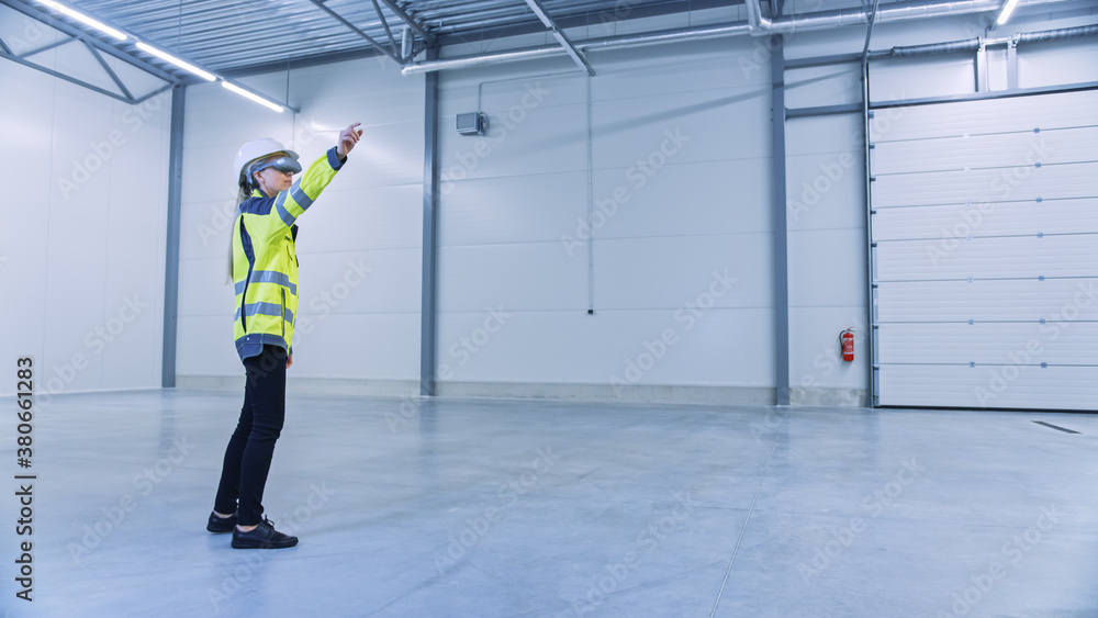 Industry 4.0 Modern Factory: Female Engineer Wearing Augmented Reality Headset Uses Mixed Reality So