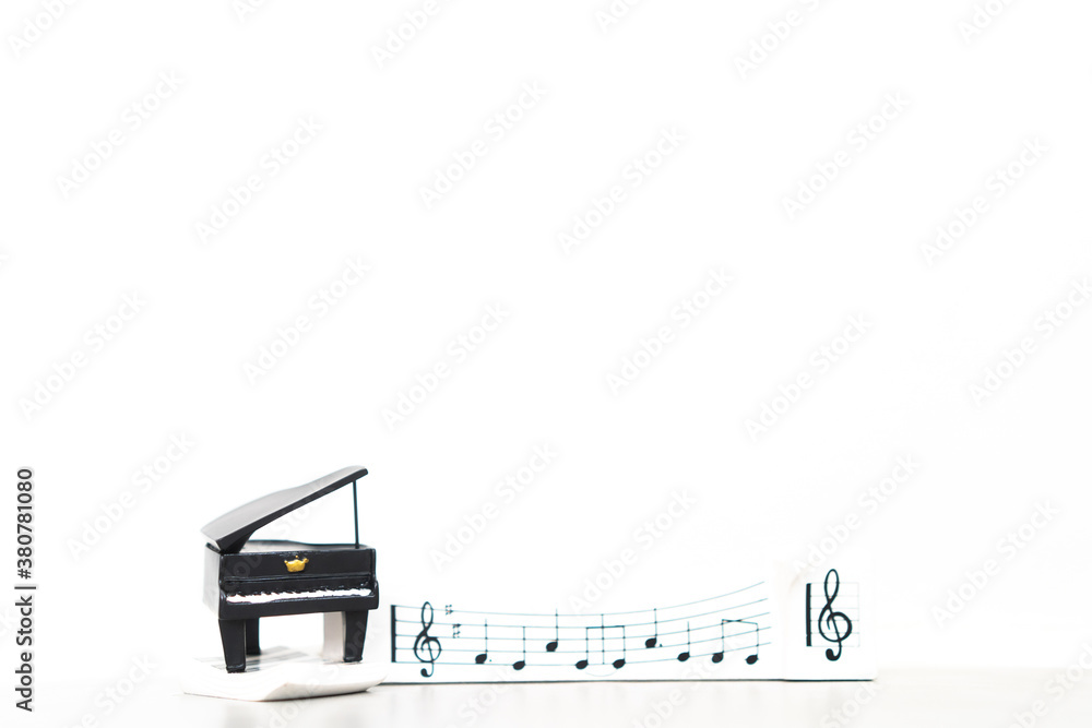 black grand piano with music note melody on white background for text template.Music sound classic i