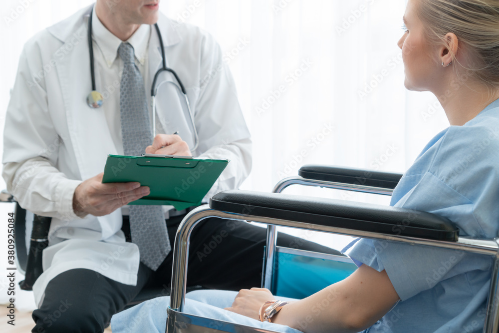 Doctor in professional uniform examining patient at hospital or medical clinic. Health care , medica