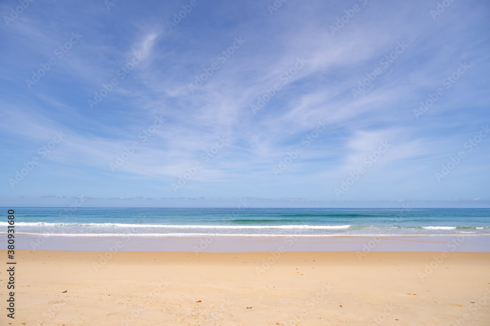 Beautiful sandy beach and tropical sea in summer season.