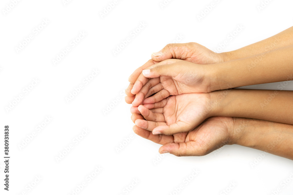 Mothers day concept of childrens hands on mothers hand isolated white background.