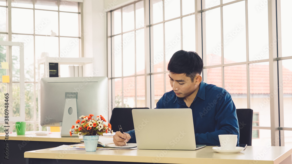 Business people working at table in modern office room while analyzing financial data report .