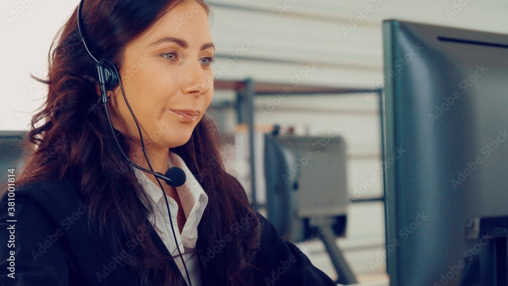 Business people wearing headset working in office to support remote customer or colleague. Call cent