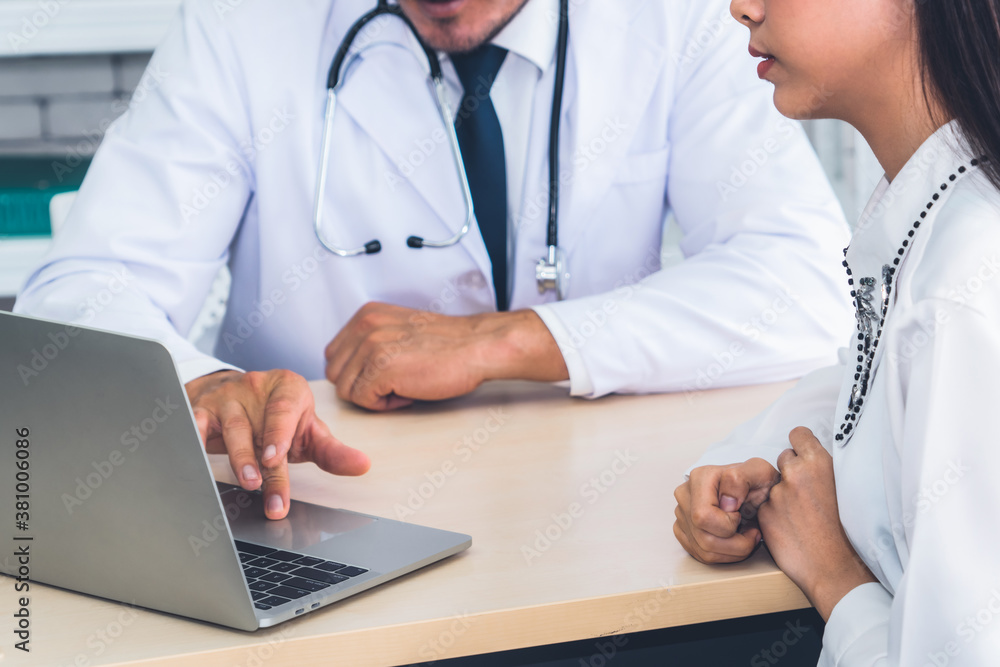 Doctor in professional uniform examining patient at hospital or medical clinic. Health care , medica