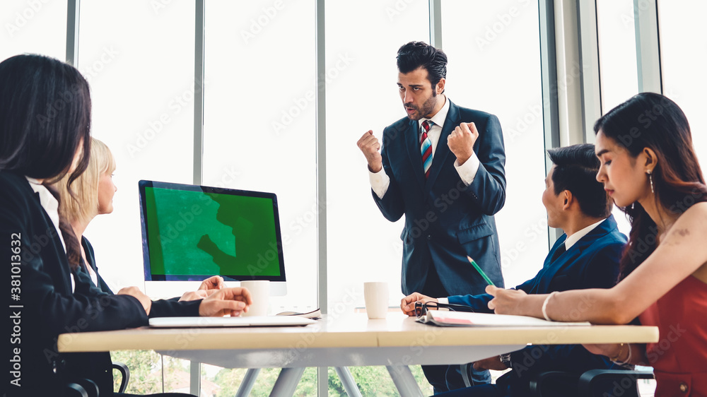 Business people in the conference room with green screen chroma key TV or computer on the office tab