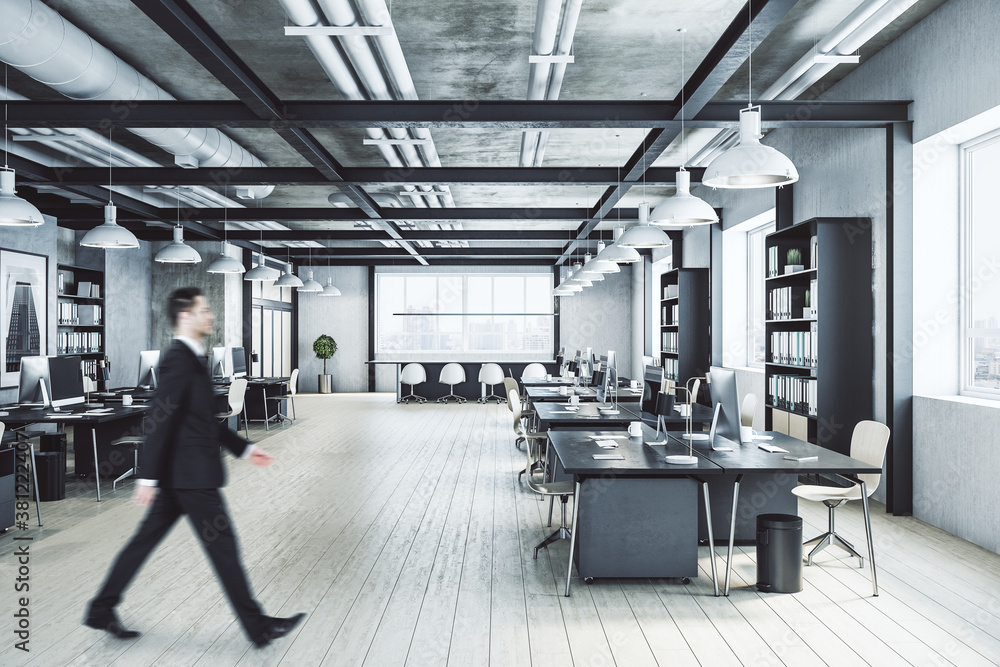 Businessman walking in coworking office