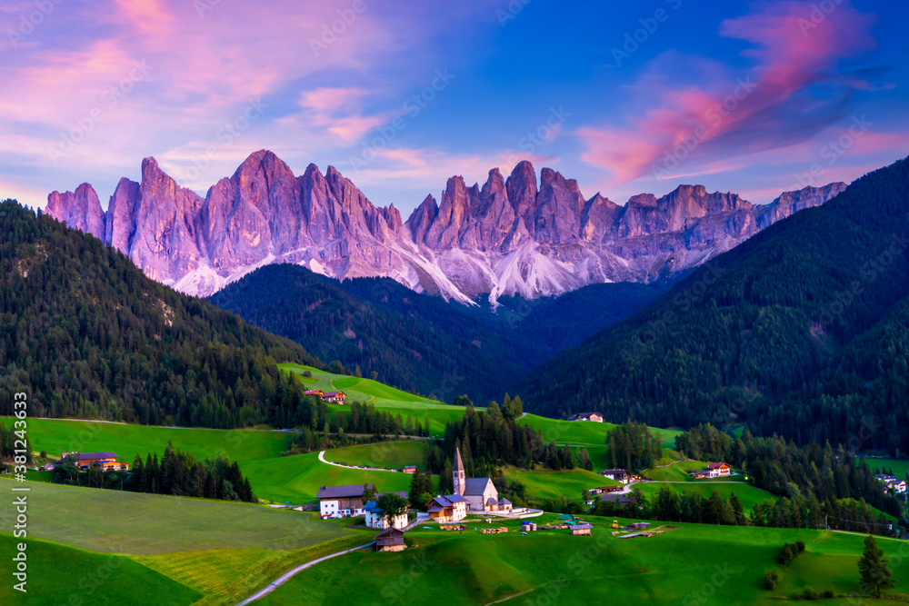 Village in the Dolomites mountain peaks in the Val di Funes, La Villa alpine village in Dolomites Mo