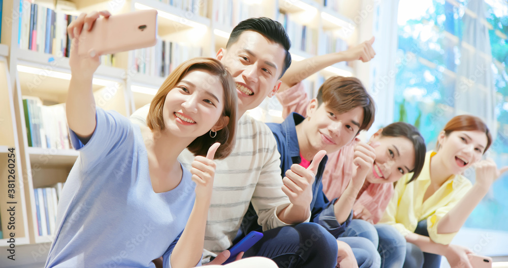 asian young friends take selfie