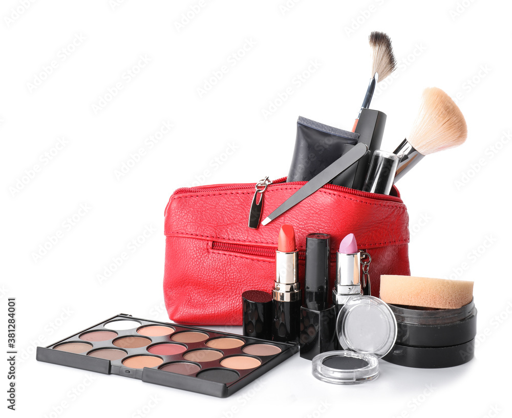 Makeup bag with decorative cosmetics on white background