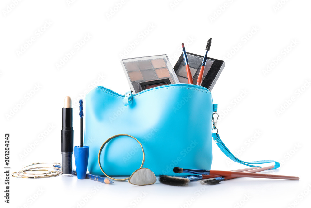 Makeup bag with decorative cosmetics and accessories on white background