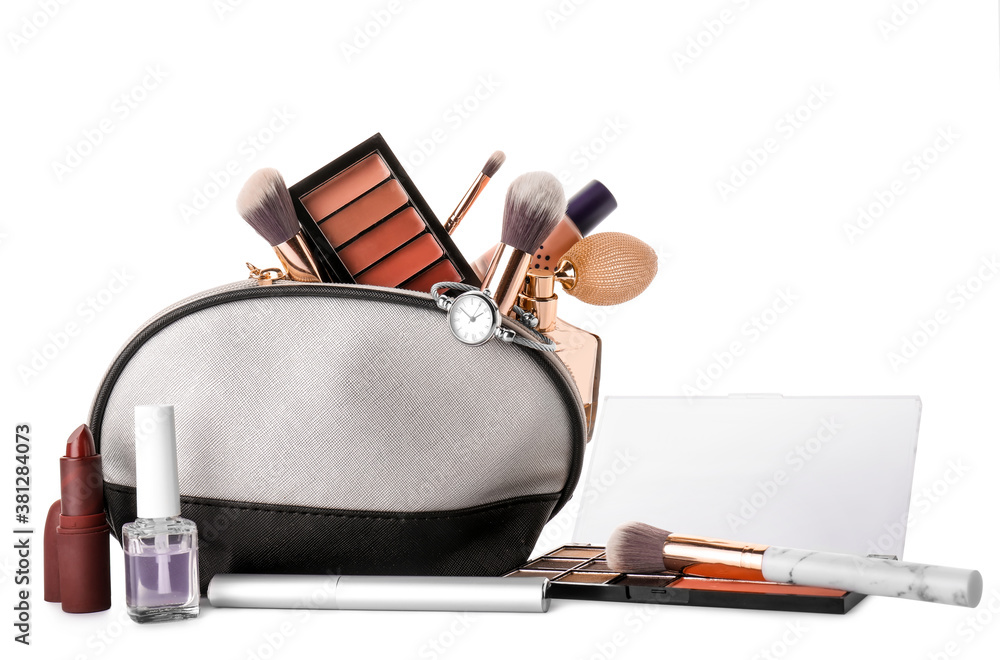 Makeup bag with decorative cosmetics and accessories on white background