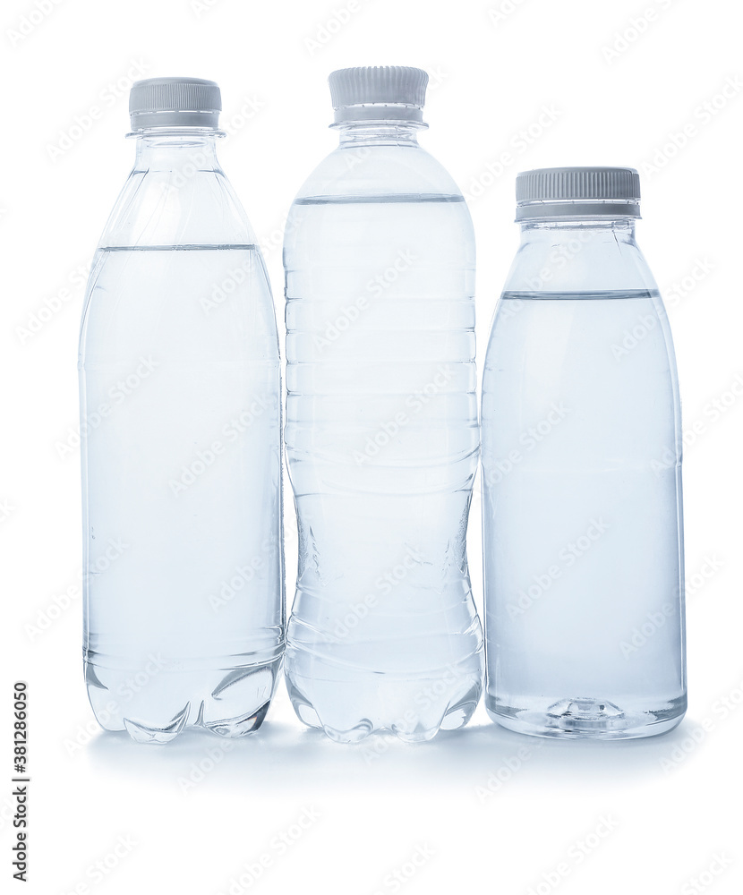 Bottles of clean water on white background