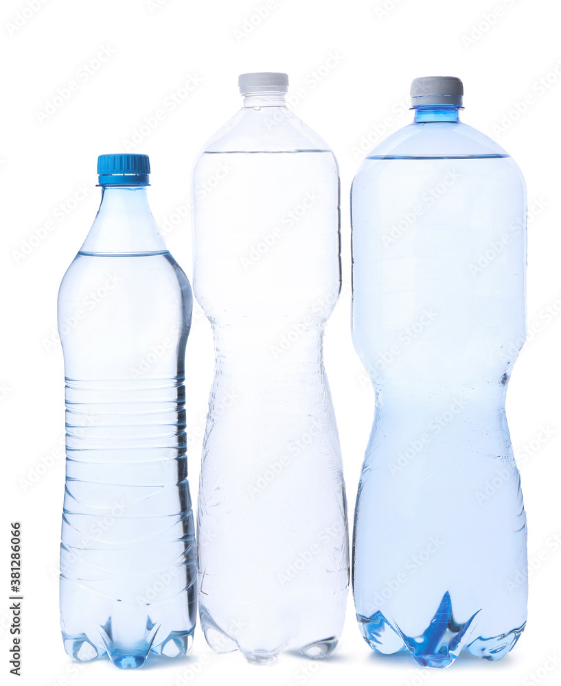 Bottles of clean water on white background