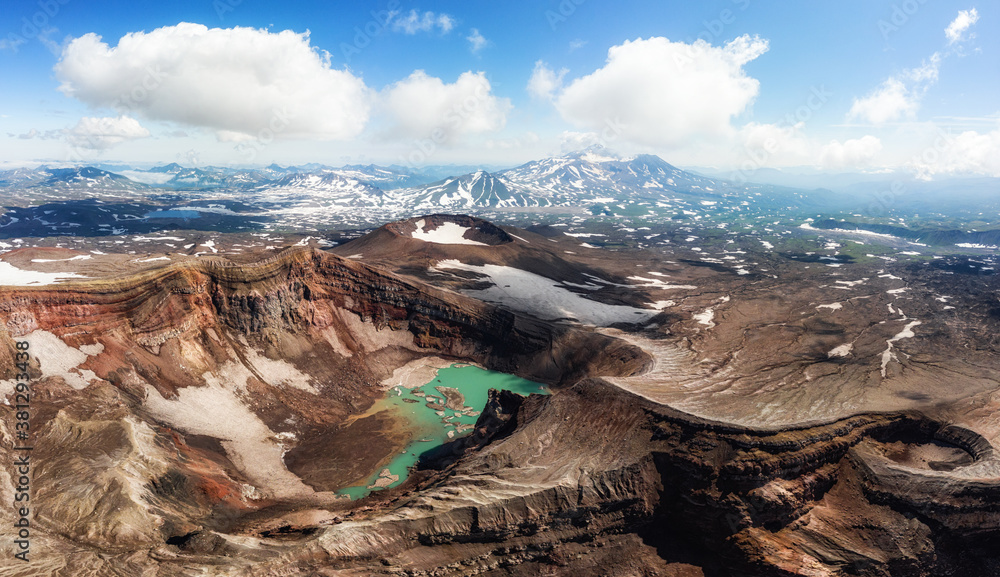 Gorely Volcano crater lake and impressive glacier with Mutnovsky Volcano in the background