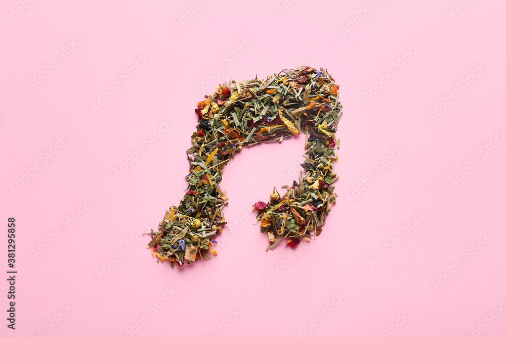 Music note made of dry tea on color background