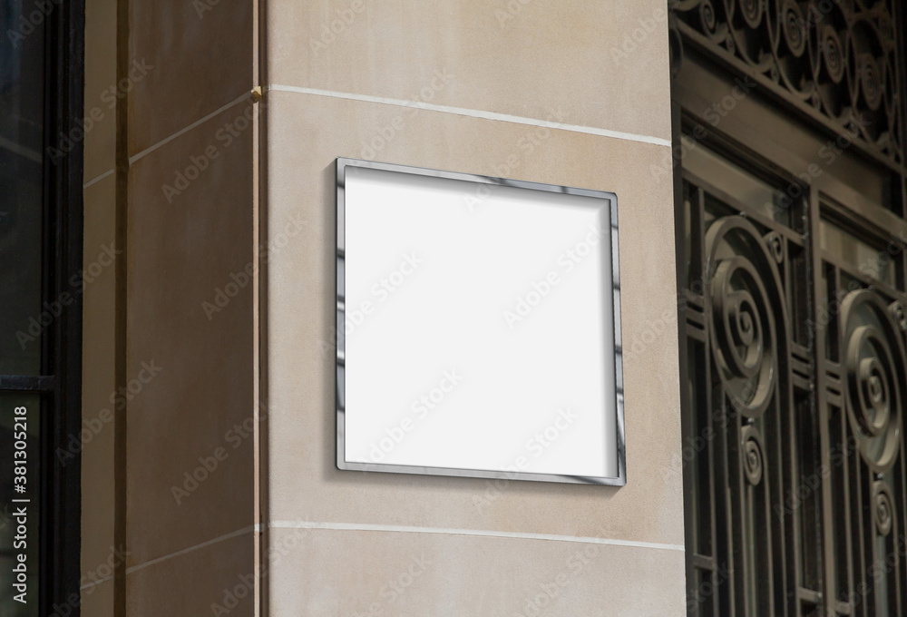 Metal frame hanging in street mockup. Template of a picture framed on a wall bathed in sunlight 3D r