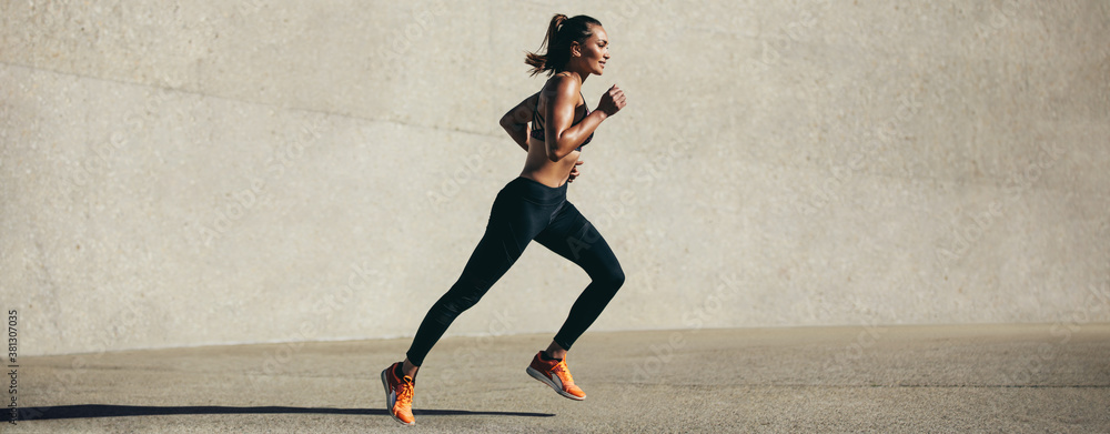 Healthy young woman on morning run